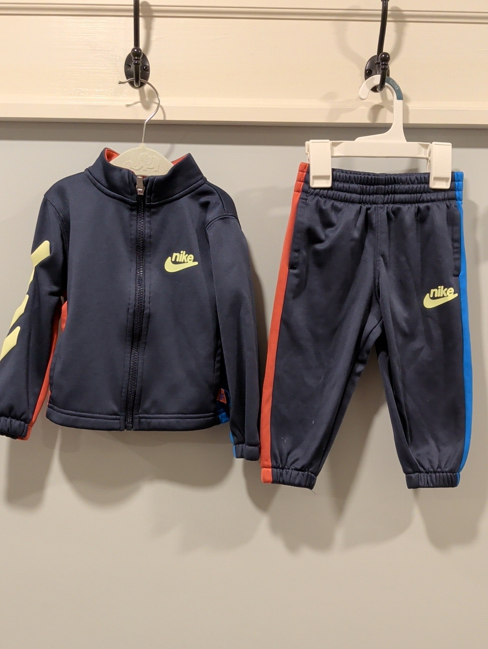 Nike Navy Kids Track Sweatpants with Red & Blue Side Stripes